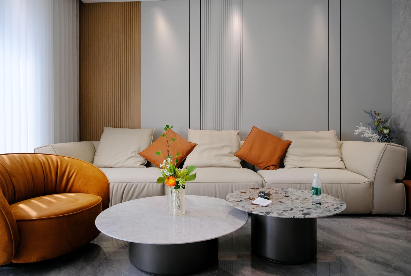 Living room with custom sofa and fluted wall panelling
