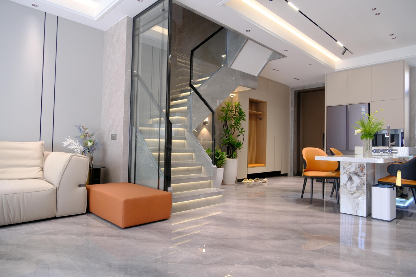 Entrance hall, staircase and dining island